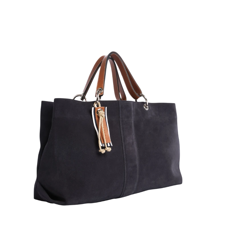 sac de ville modulable en cuir vachette velours bleu marine avec des anses en cuir naturel